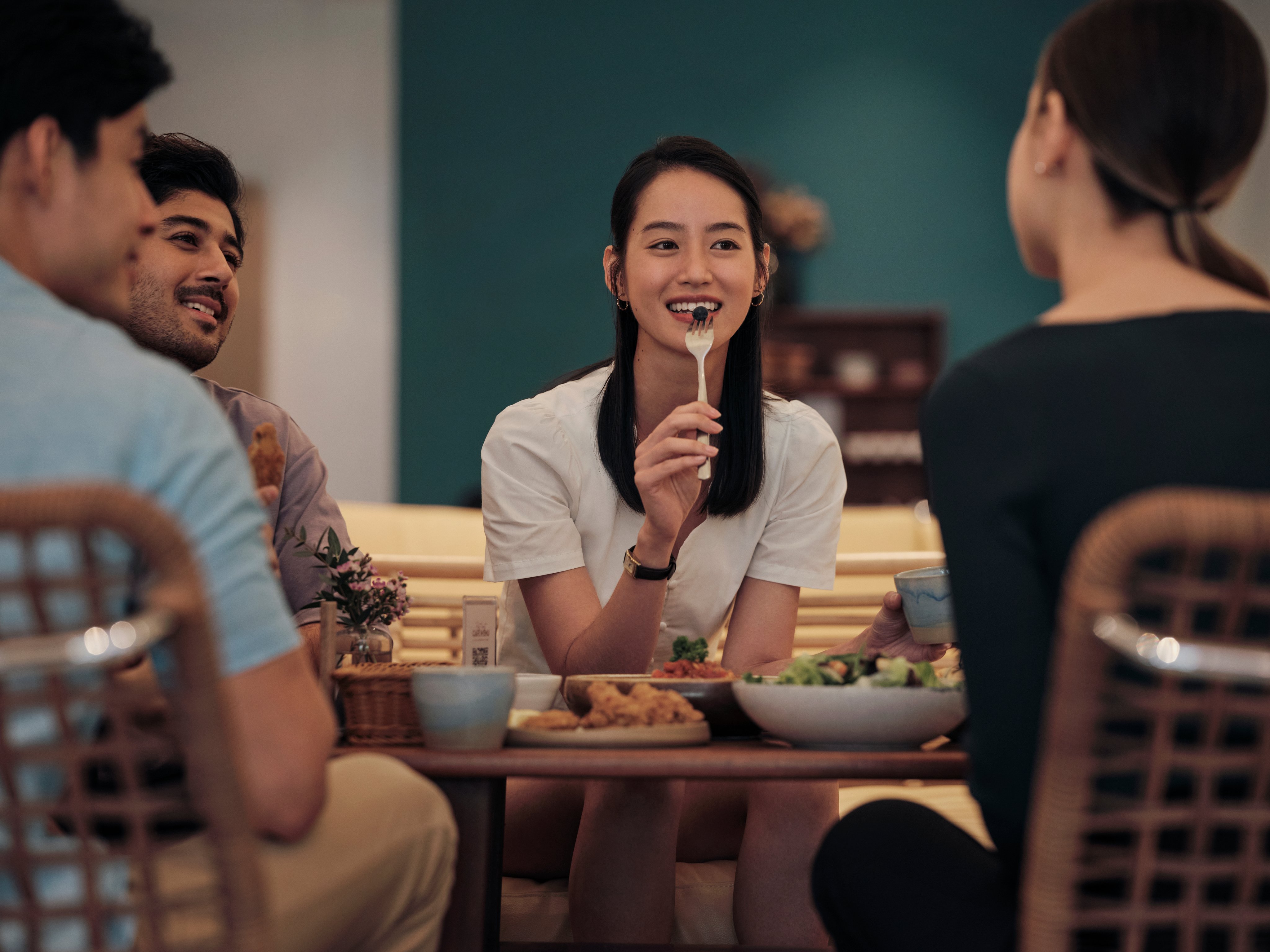 Ordering and drinking coffee at a QSR restaurant coffee shop