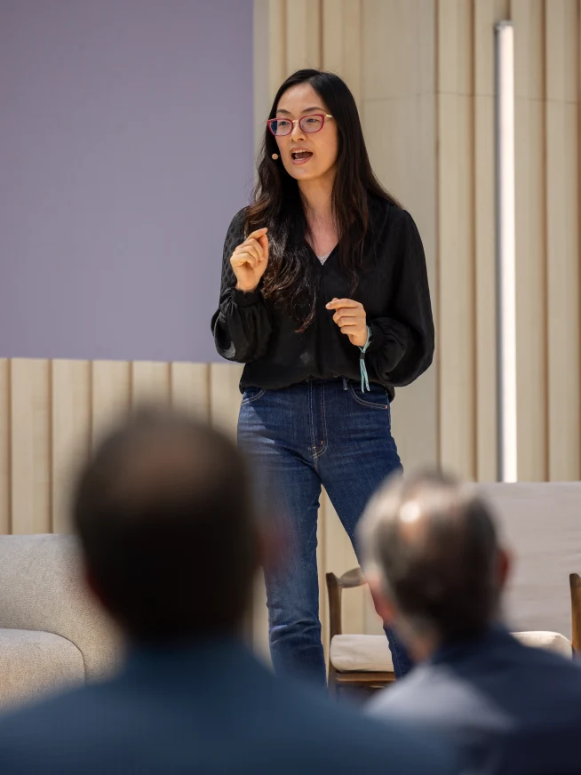 Adyen team member presenting to colleagues in the Adyen office