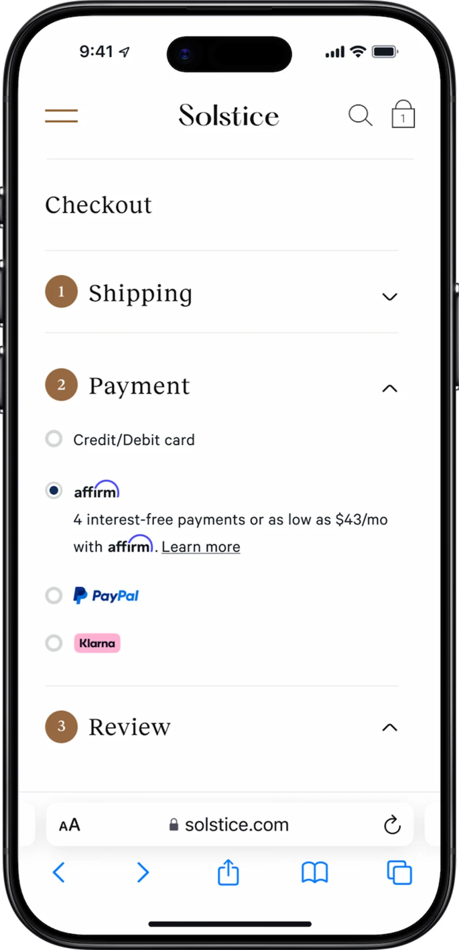 Mobile device screen showing an online checkout process with payment options including Adyen.