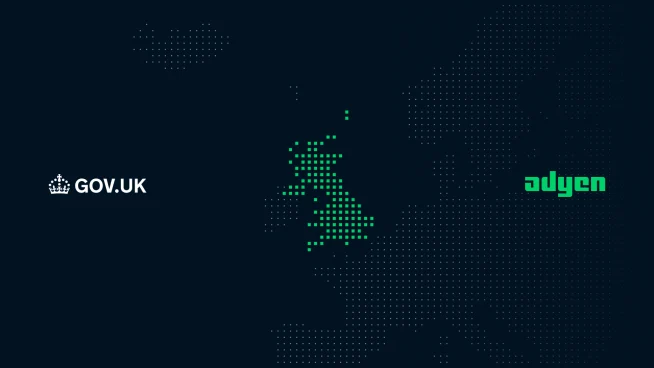 Map of the UK with Adyen branding and digital graphics representing payment technology.