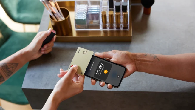 A card payment done on an iphone in AED