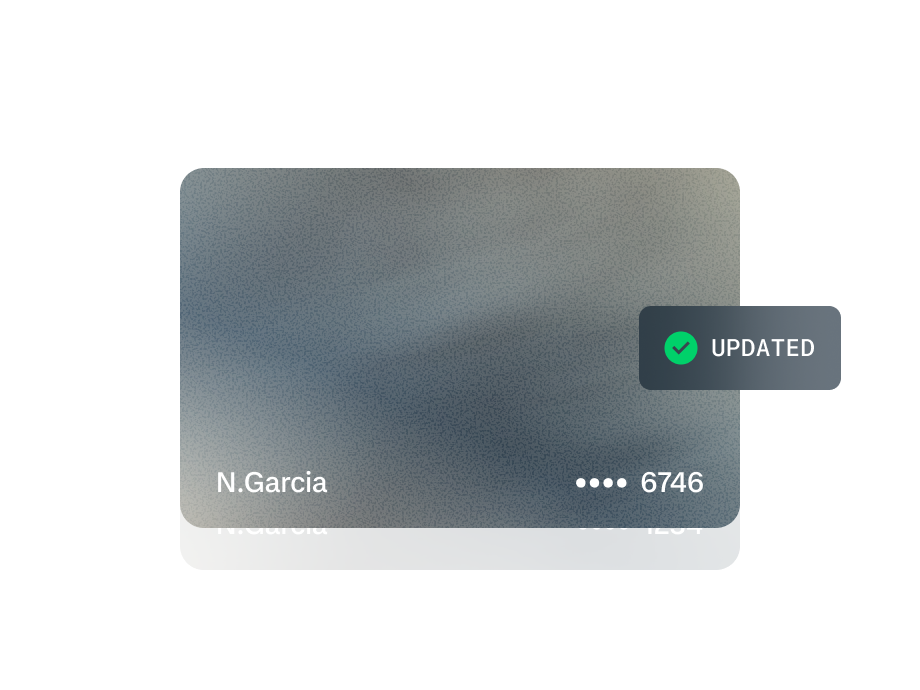 Adyen team members updating a digital interface with customer payment details on an internal screen.