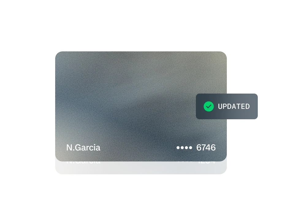 Adyen team members updating a digital interface with customer payment details on an internal screen.