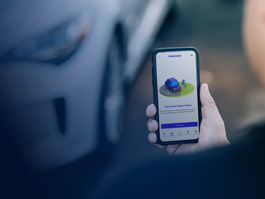 A customer makes a mobile payment using an Adyen terminal in a retail setting