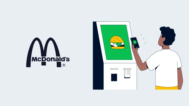 Pessoa usando um dispositivo móvel para interagir com um quiosque digital