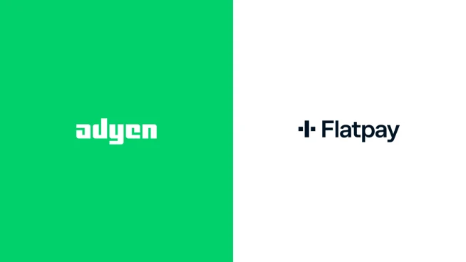 Adyen employees in the office demonstrating payment terminals and branding for a business consultation or demonstration.