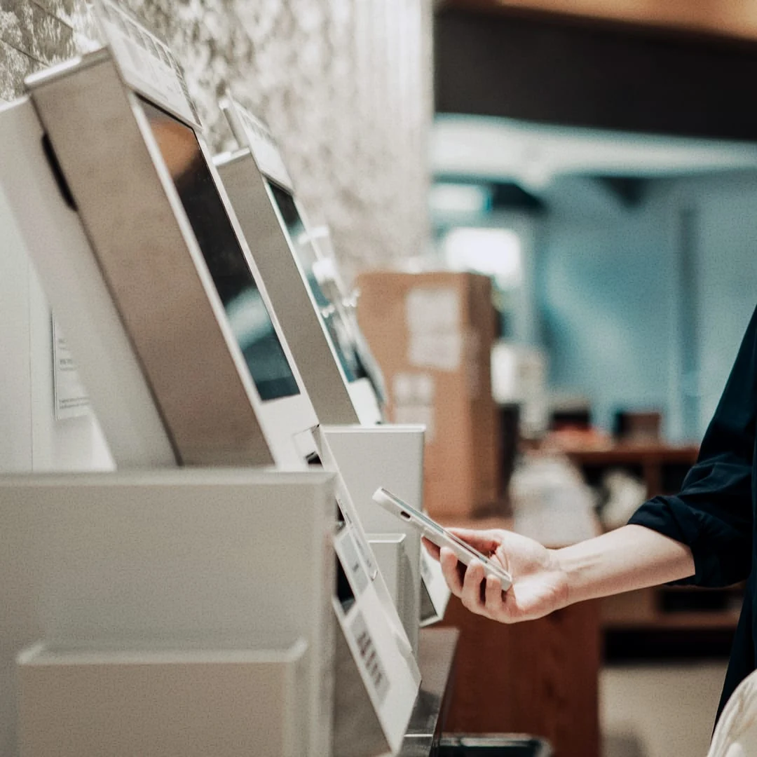 Adyen employees using payment terminals at an internal office with payment activity provided by Adyen.