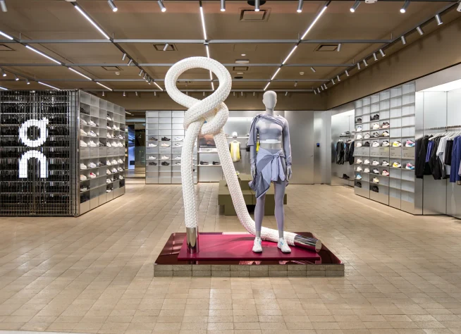 Display of fashion mannequins and accessories in a retail store setting