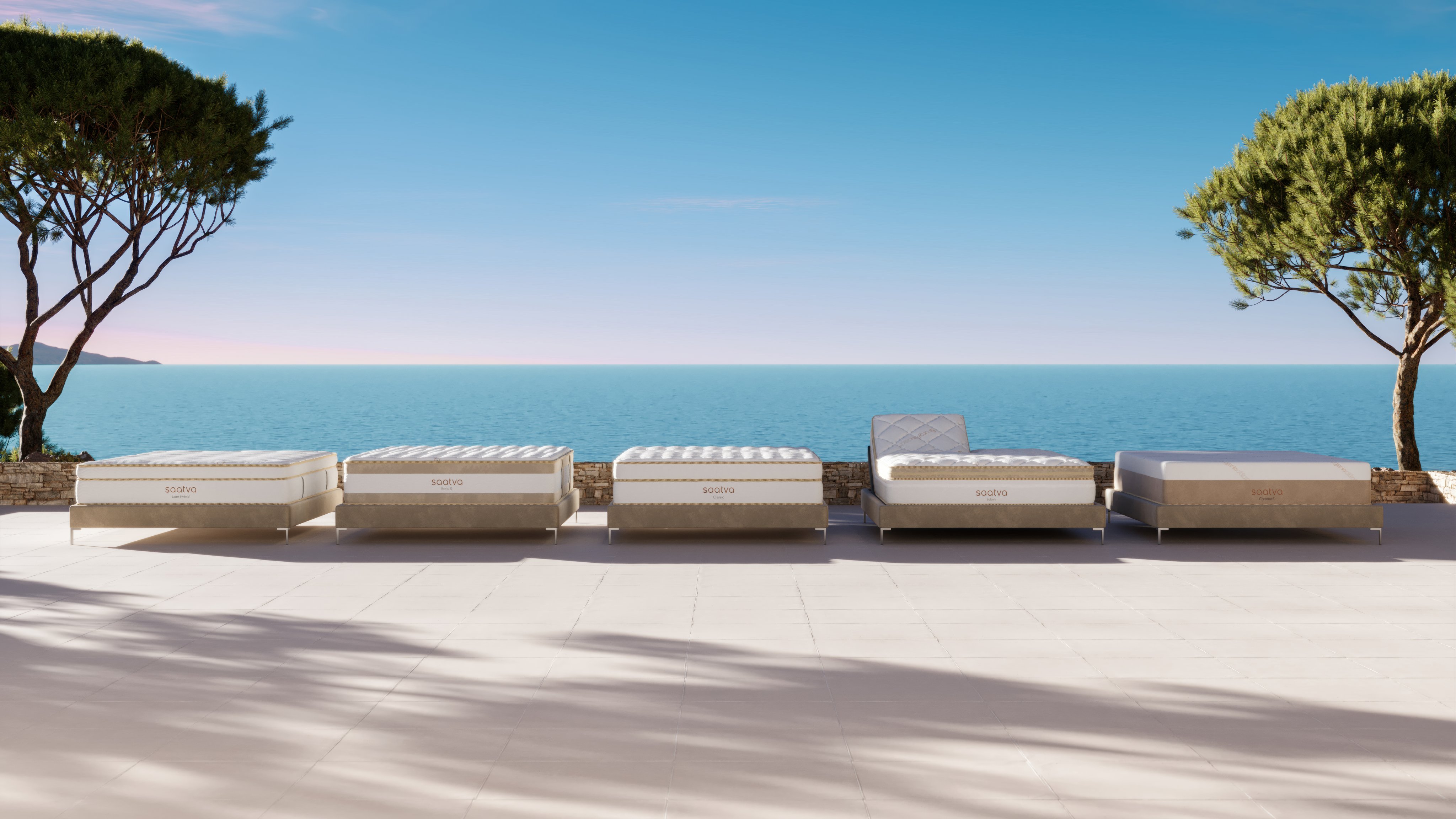 Saatva seaside lounge chairs with ocean view, perfect for relaxing outdoors.