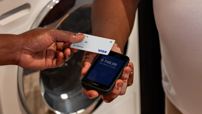 Customer using an Adyen card to pay via mobile terminal.