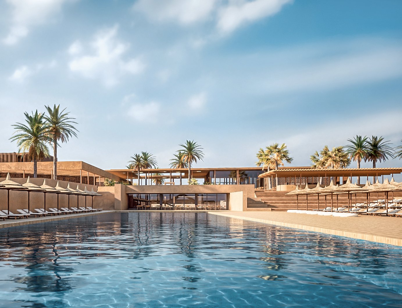 Luxuriöser Hotelpool mit Palmen und Liegestühlen im Sonnenlicht bei Aldiana Urlaub