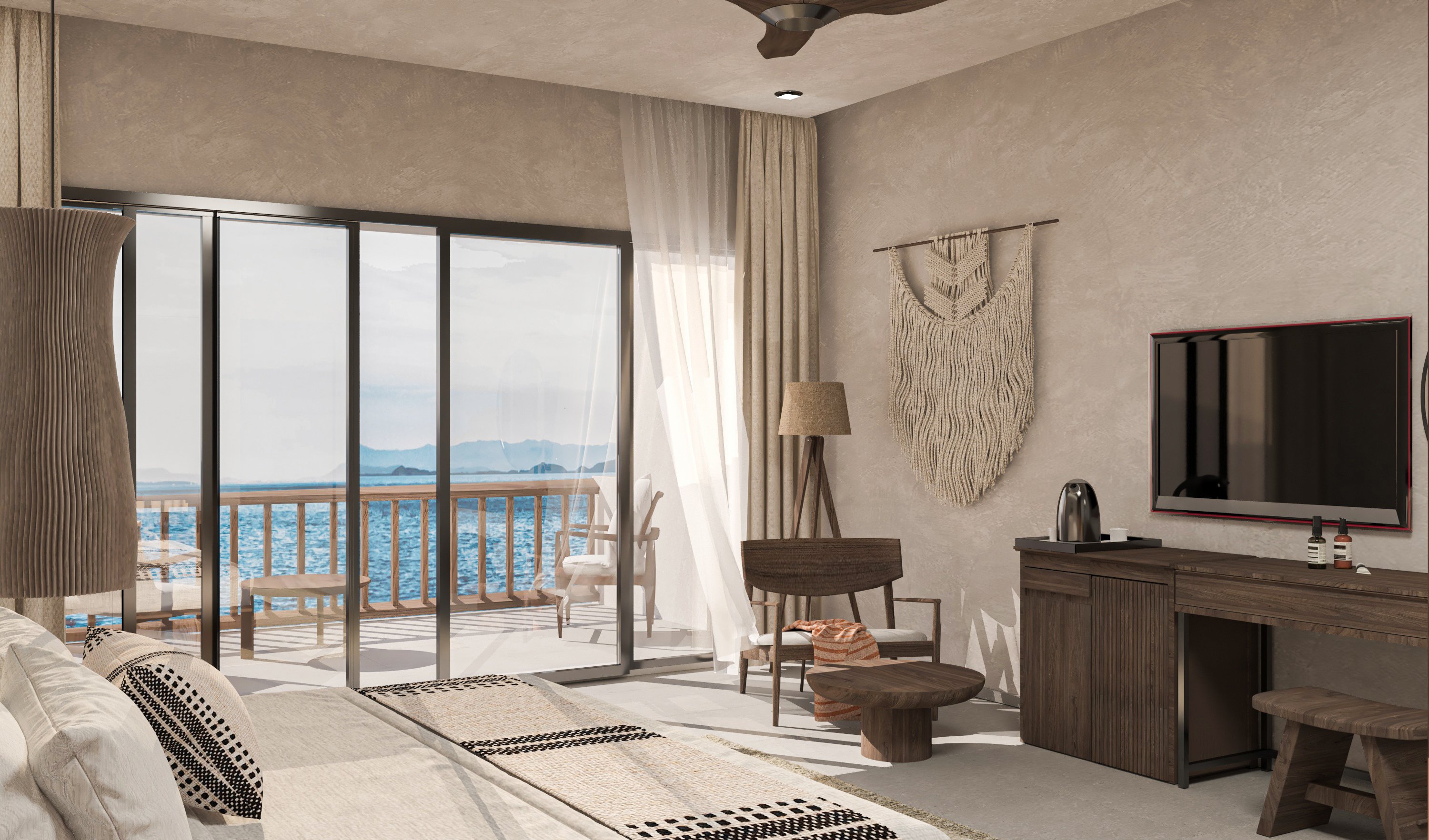 Blick auf ein Hotelzimmer mit Balkon, Meerblick, gemütlicher Einrichtung und Blick nach draußen