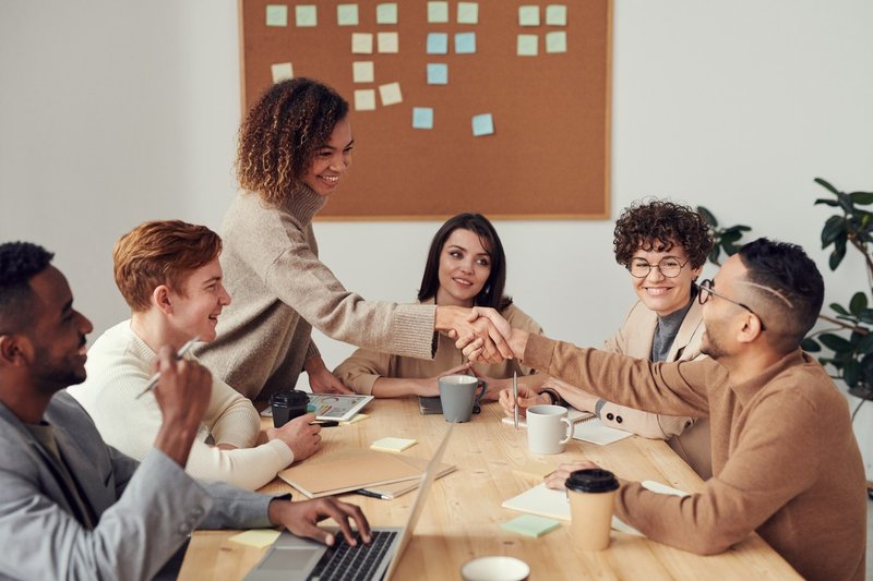 people-shaking-hands-in-meeting