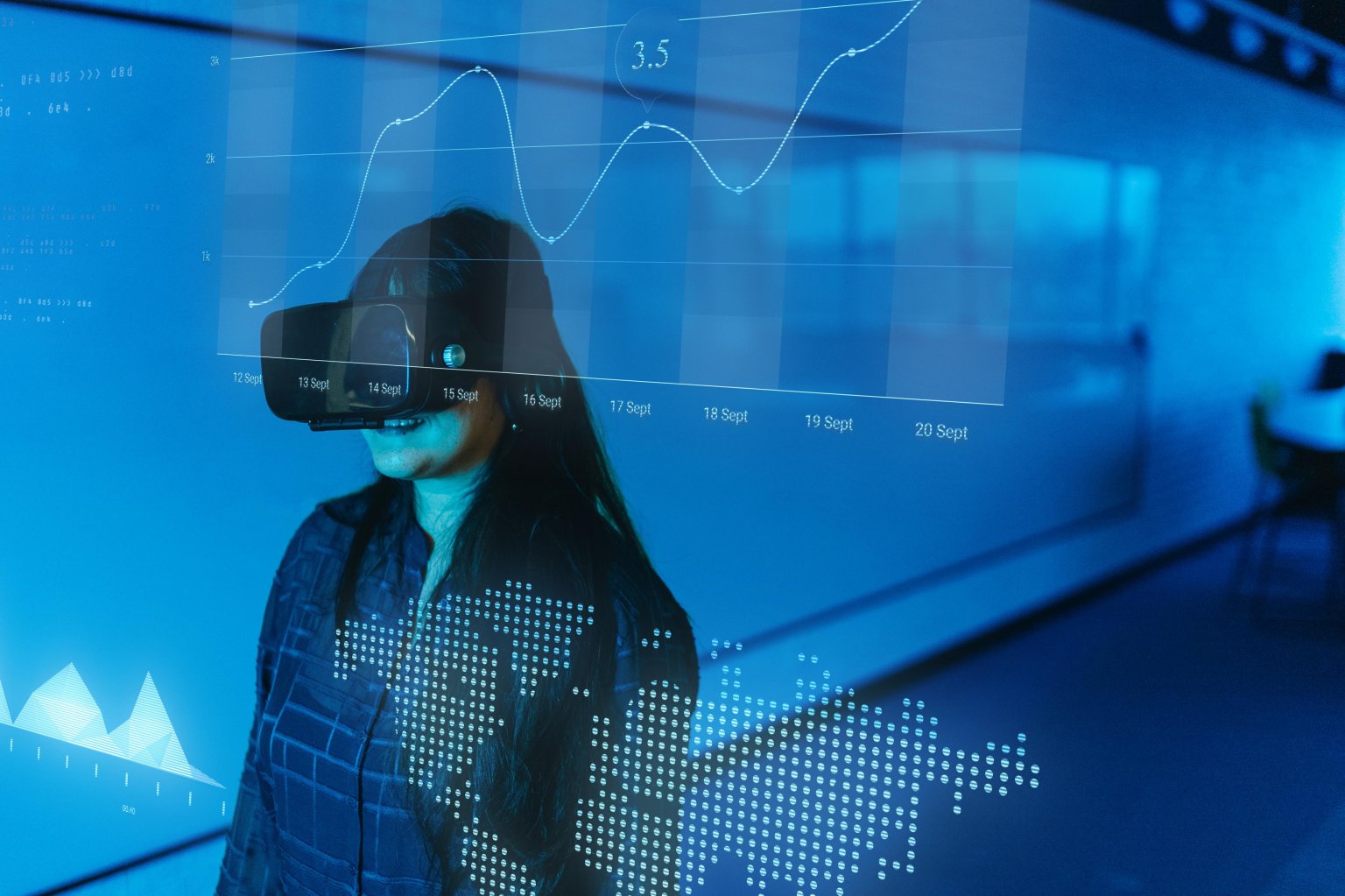 Frau mit Brille vor digitaler Finanzanalyse mit Diagrammen und Datenvisualisierung. aus dem Artikel Zukunft KI: Wege und Wirkungen
