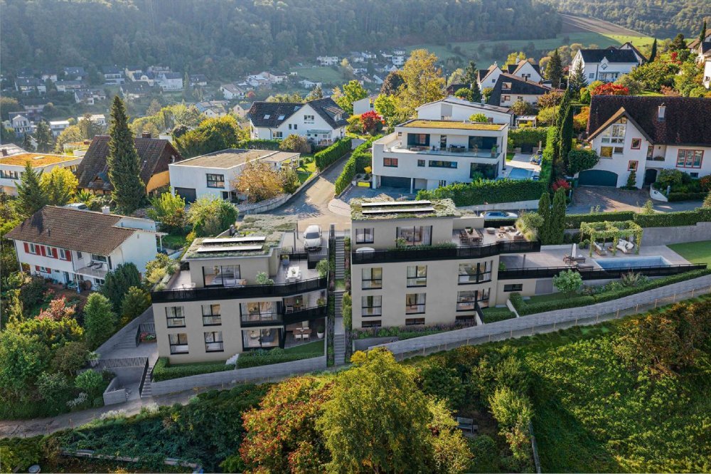 Zwei Mehrfamilienhäuser mit zwei Eigentumswohnungen in der Aussenansicht am Hagenbachweg 22, 4133 Pratteln