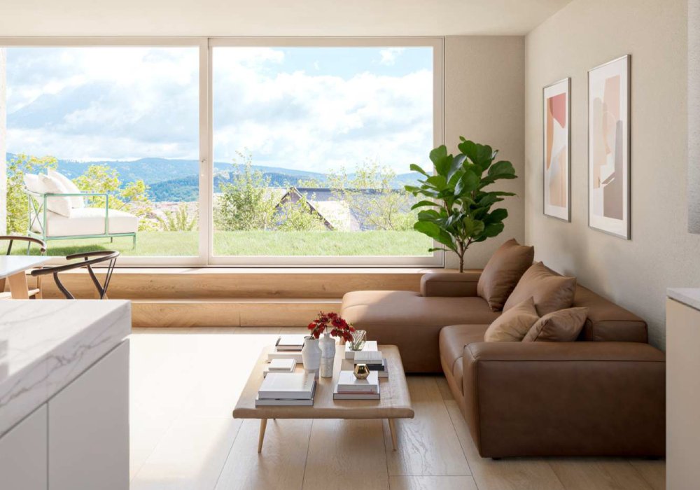 Wohnzimmer mit Sofa, Stuhl und Balkon an der Neuweilerstrasse in Biel-Benken