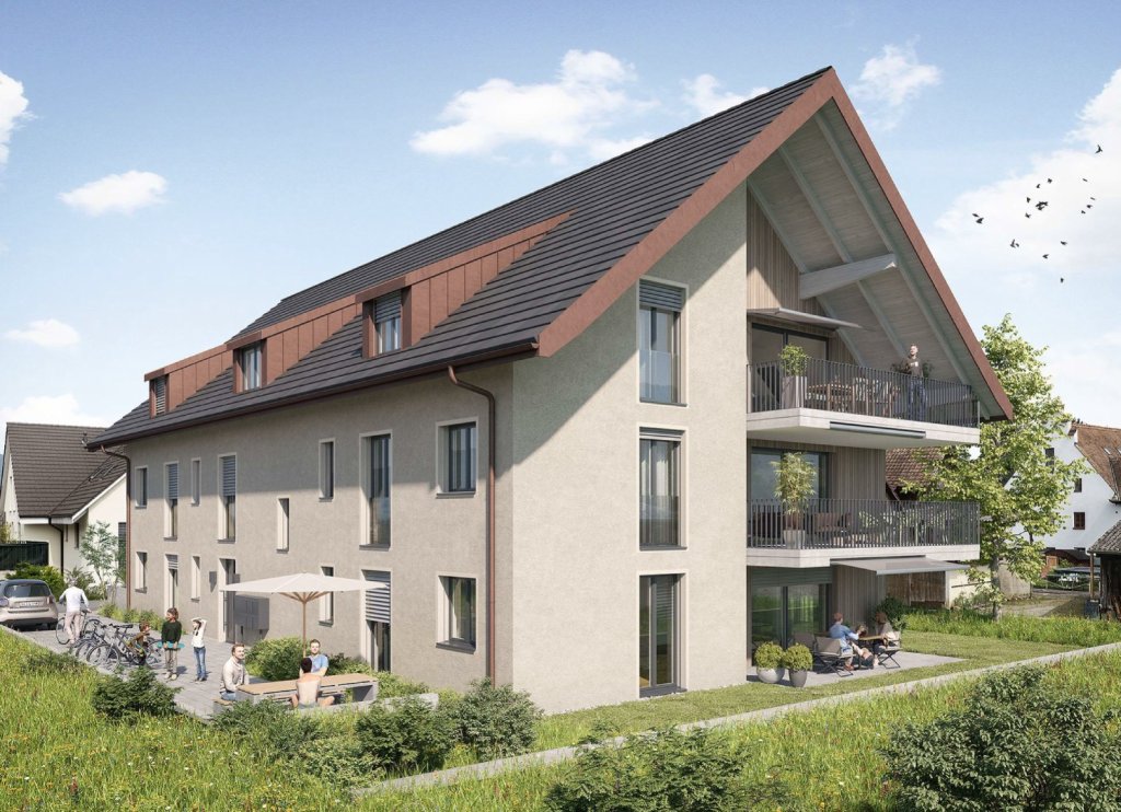 Das moderne Mehrfamilienhaus mit Terrassen und sonnigem Garten im ländlichen Stil.