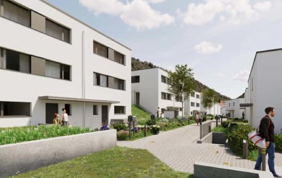 Weisse Doppeleinfamilienhäuser am Sonnenmatt in Tecknau.