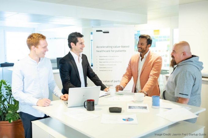 4 Männer von Lyfegen in einem Meeting.