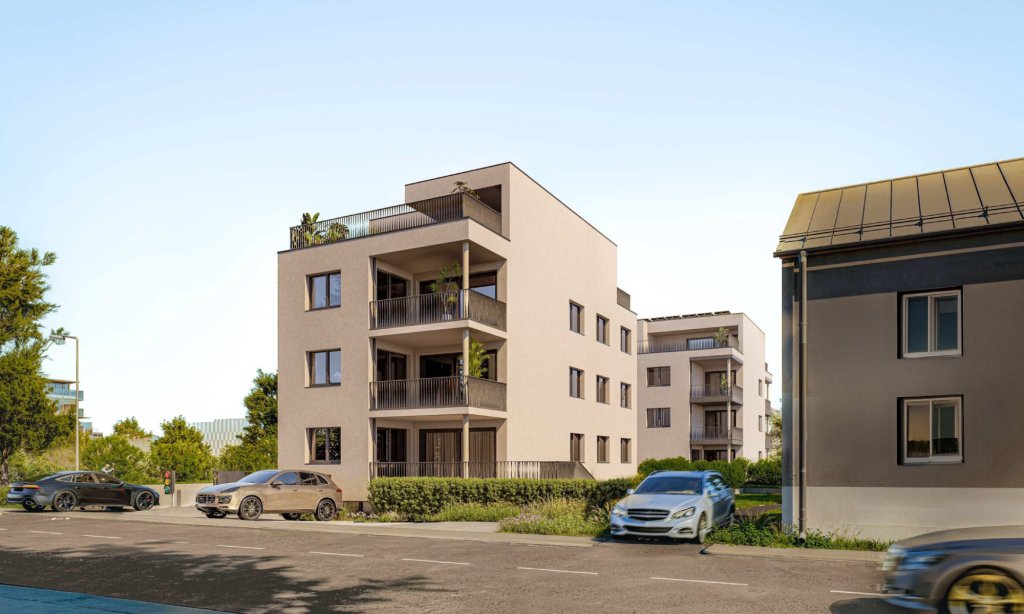 Beigefarbenes Mehrfamilienhaus mit Eigentumswohnungen am Lettenweg in Allschwil.