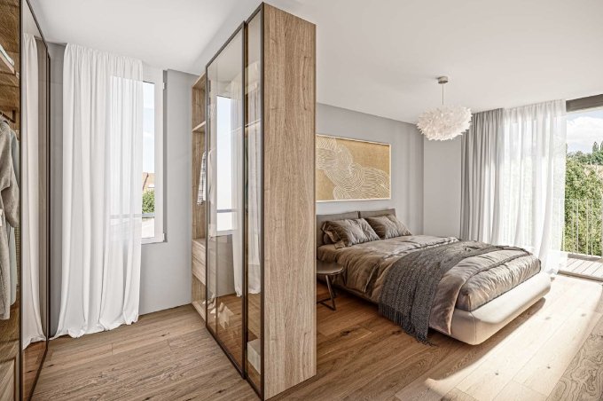 Schlafzimmer mit Bett, Schrank und Balkon an der Breitenbachstrasse in Laufen.