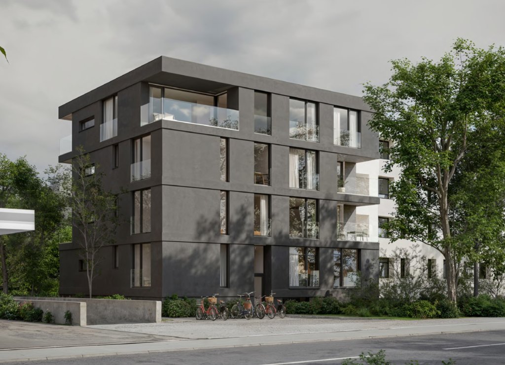 Schwarzgraues Mehrfamilienhaus mit Eigentumswohnungen an der St. Jakob-Strasse in Muttenz.