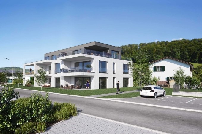 Mehrfamilienhaus mit Eigentumswohnungen und Balkonen an der Lärchenstrasse im Bubendorf