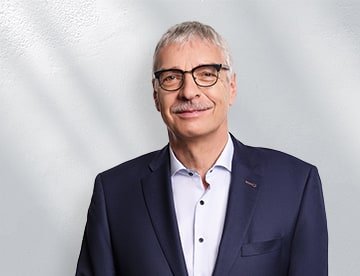 Porträt von Unternehmer Urs Grütter