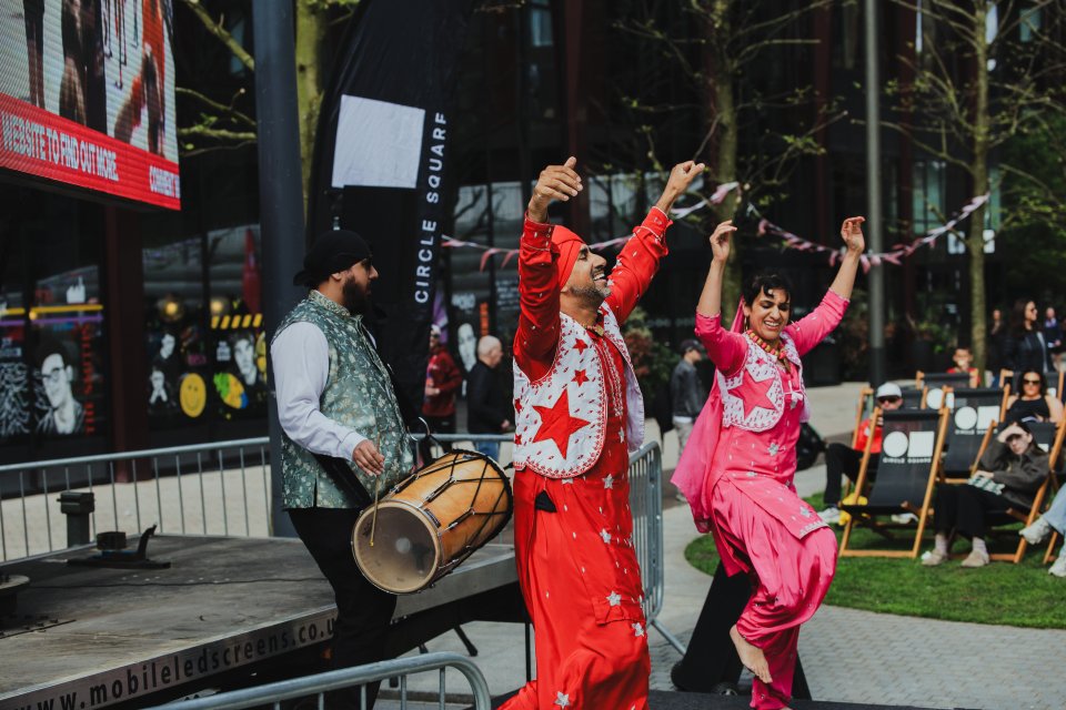 Bhangra dancers at Circle Square marathon fan zone