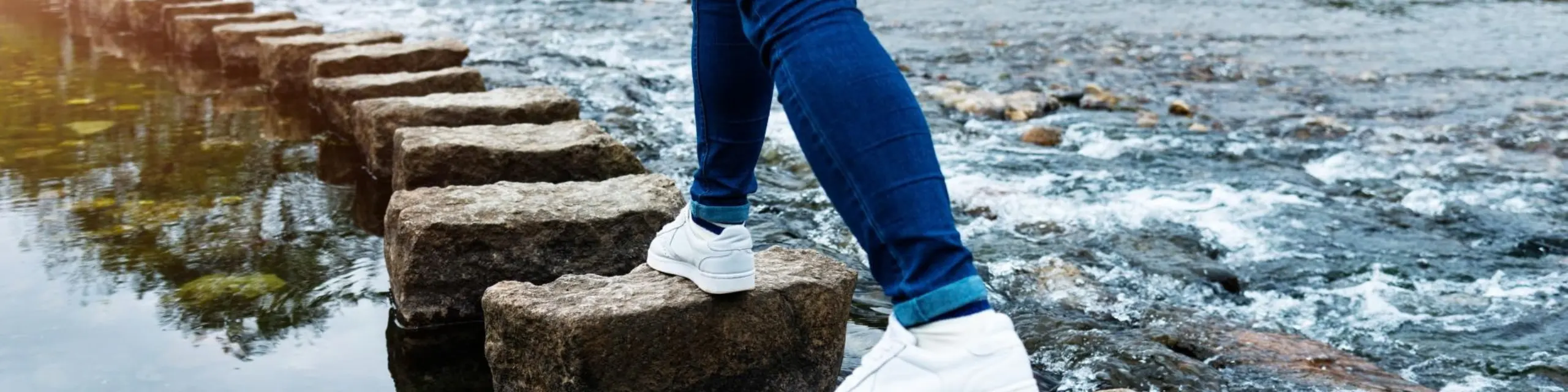 A person walking in stone steps