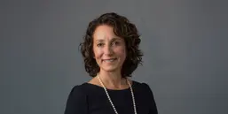 Photo of Dr Susan Margulies, Assistant Director of the National Science Foundation Engineering Directorate, on a decorative background. Photo credit: Emory University