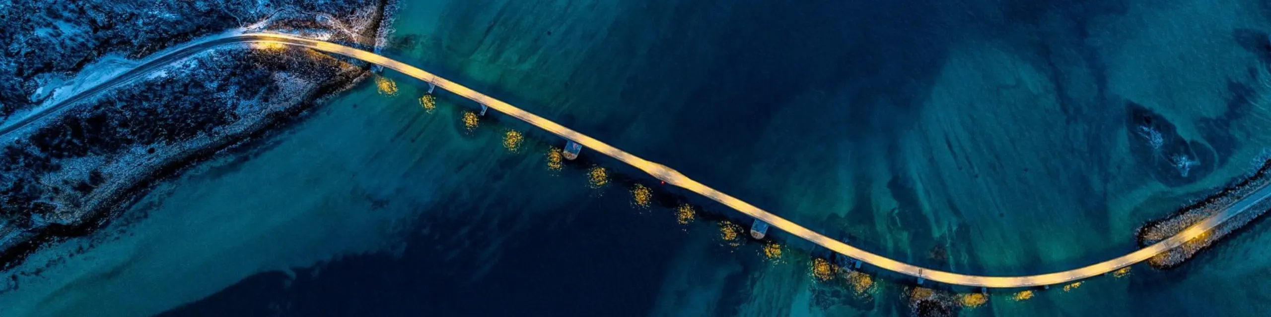 A bridge above waters connected to the city