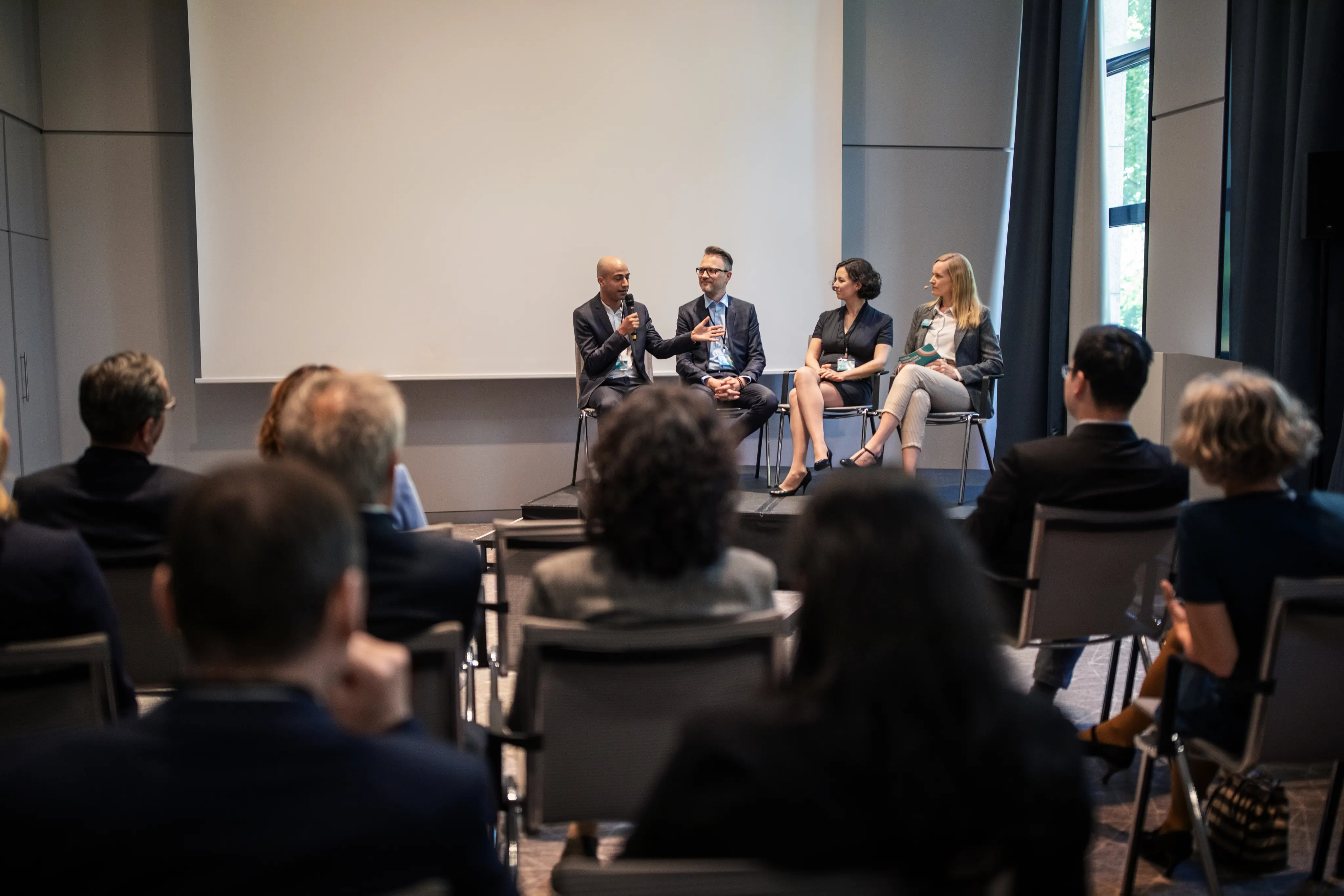 Professionals in convention center during seminar