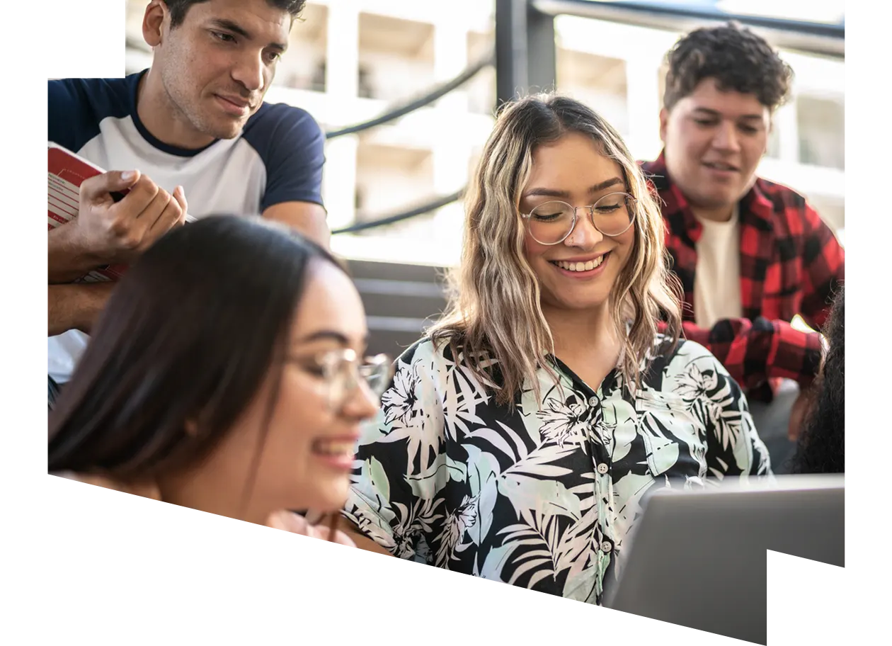 Smiling young woman holding digital tablet