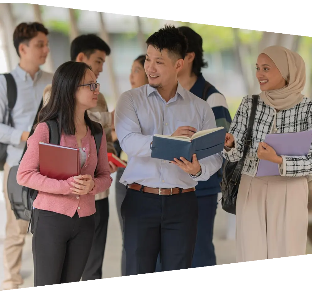 Asian male lecture having conversation with students