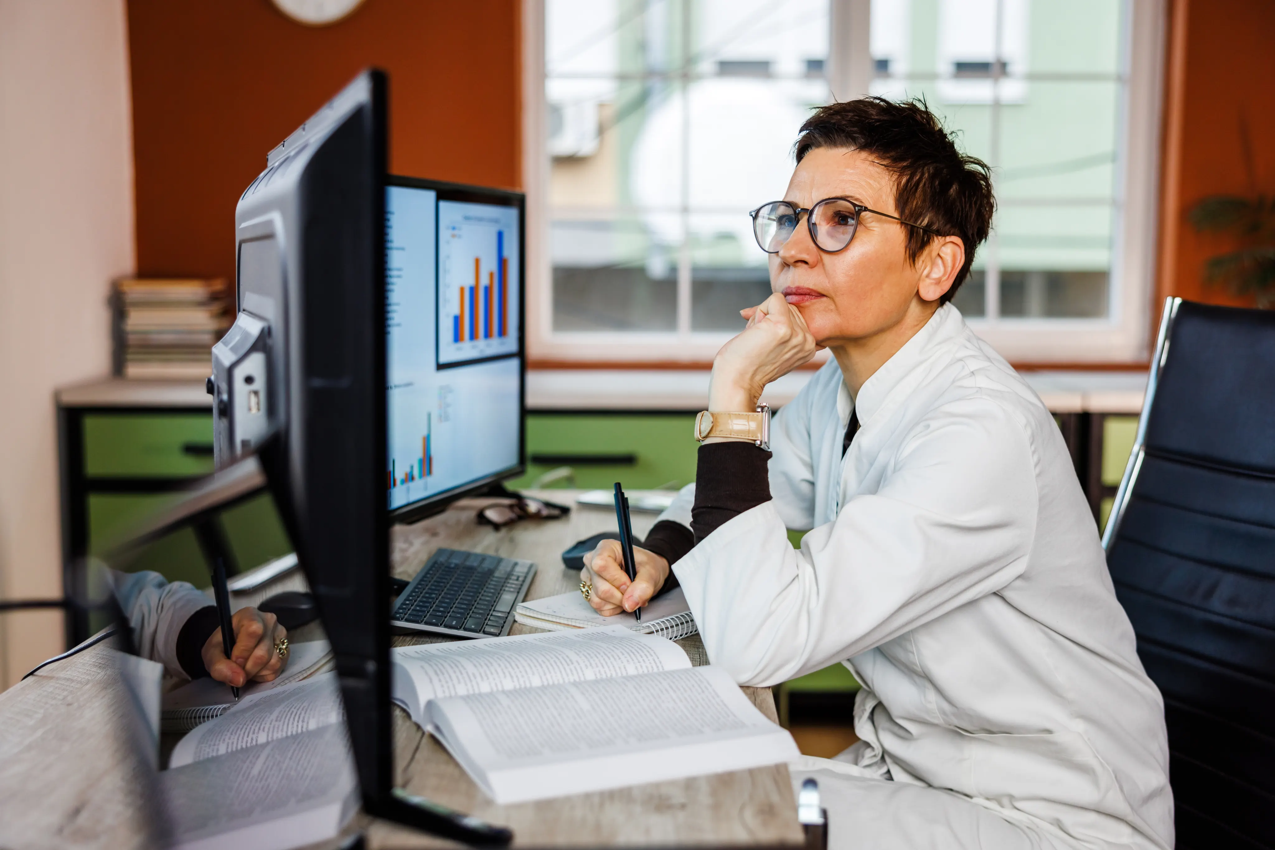Woman Using Advanced Technology for Data Analysis