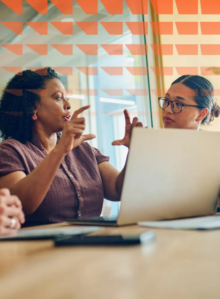 Diverse professionals brainstorming in modern office