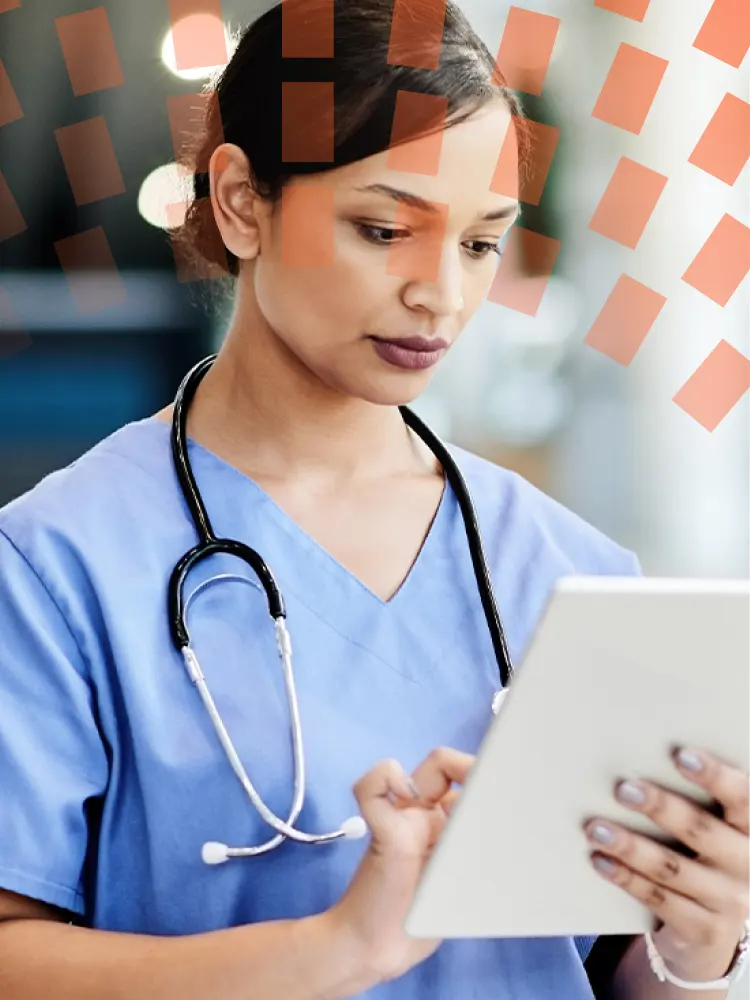 Young Female Nurse - Looking at Tablet