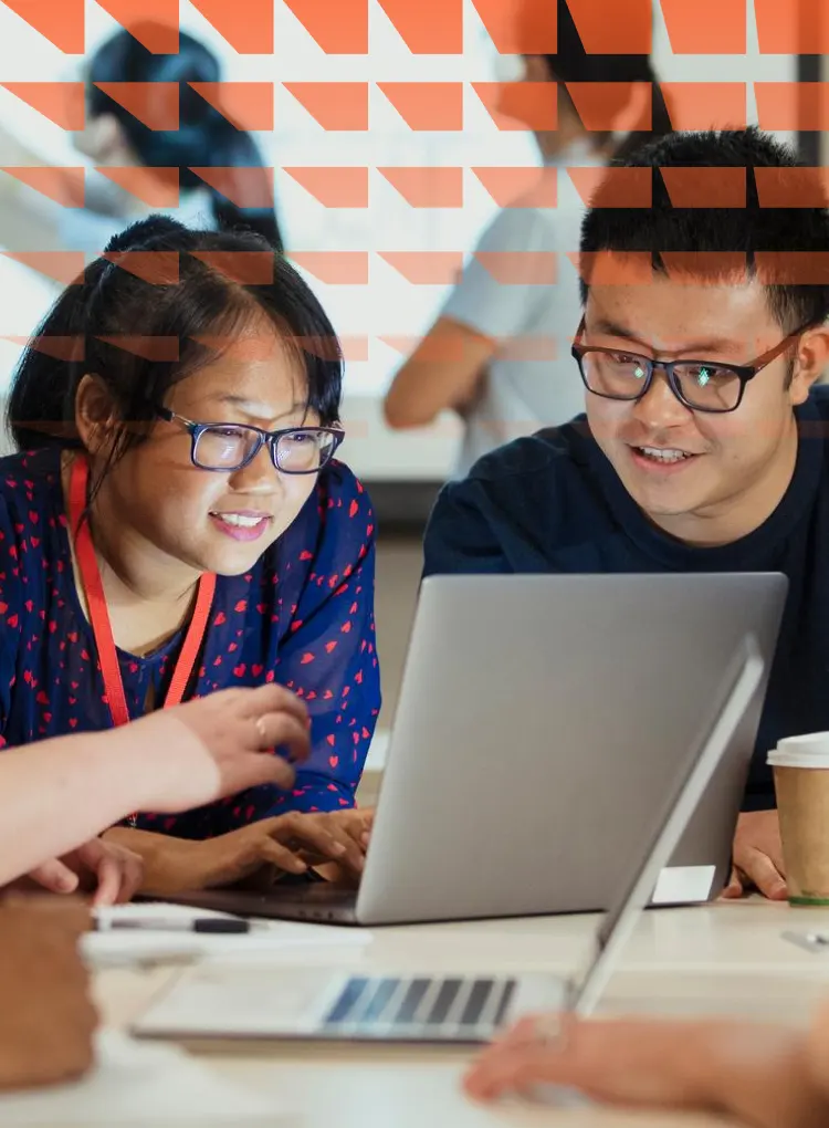 Close-up of group of colleagues sitting around a table