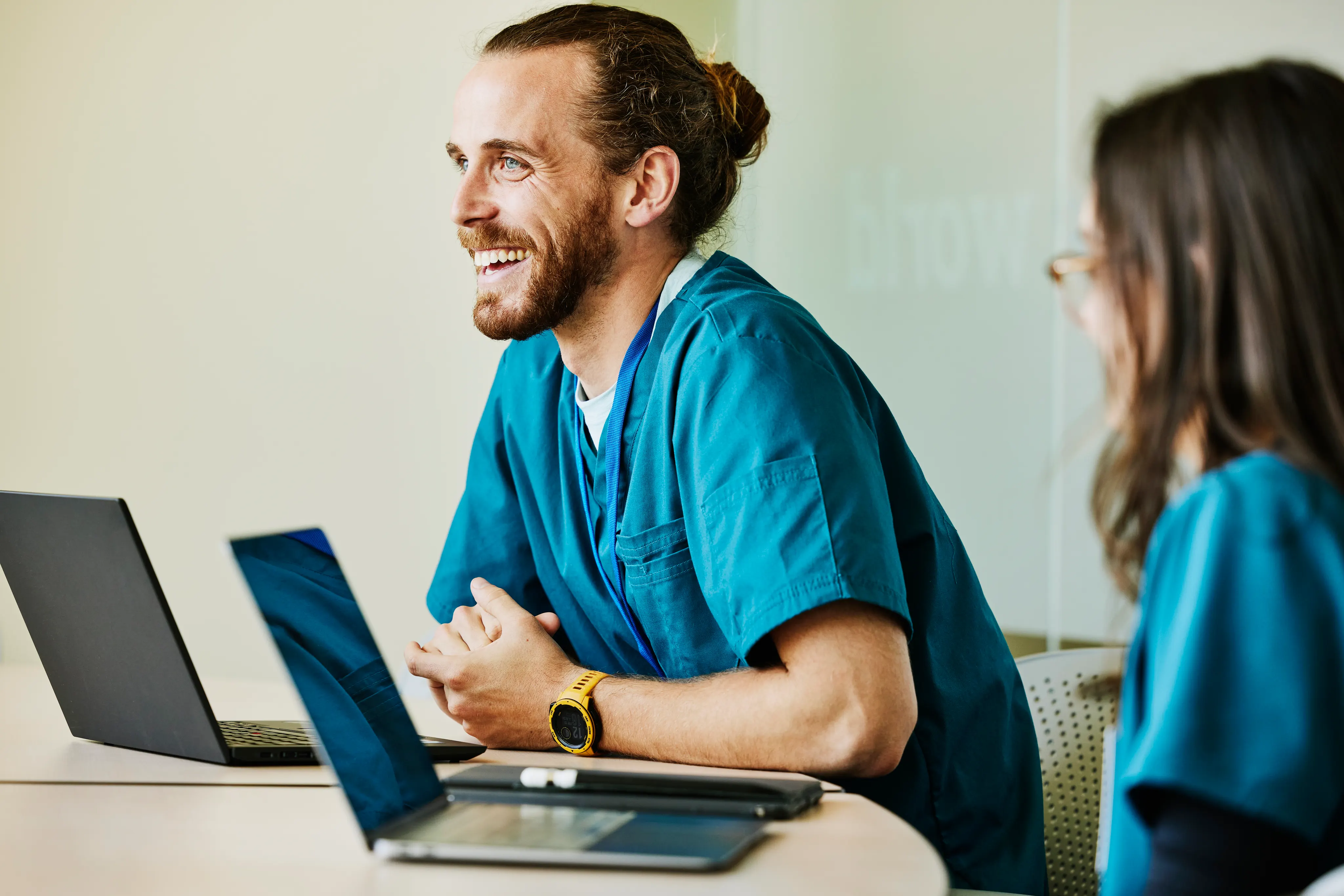 Clinicians on laptops