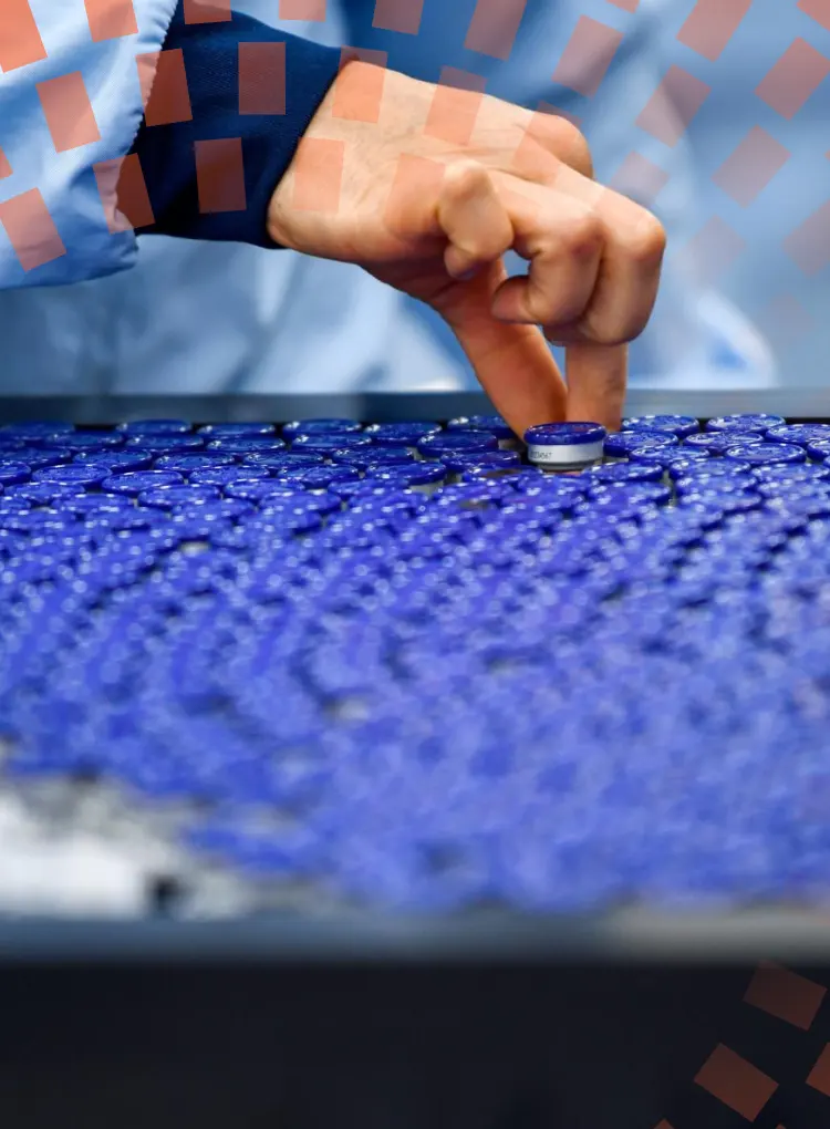 Collection of drugs being handled on an assembly line