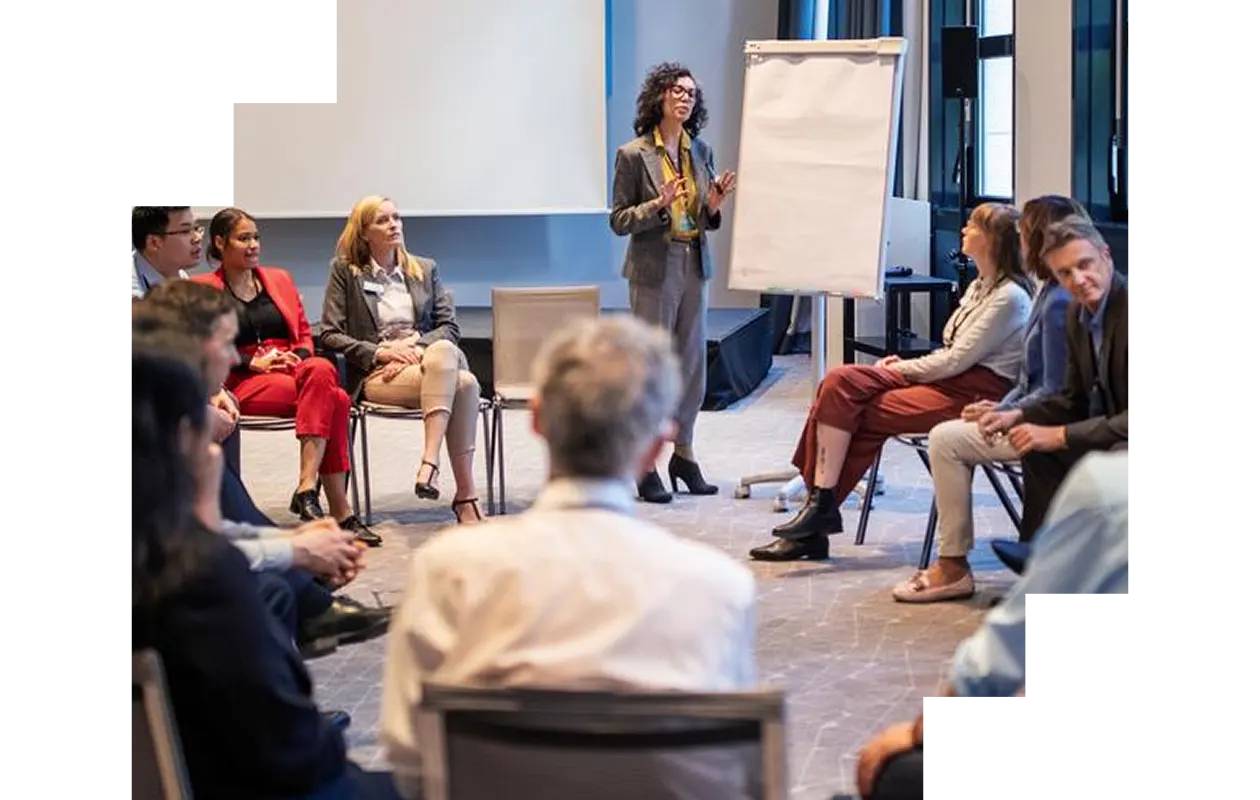 Professional woman presenting at a conference