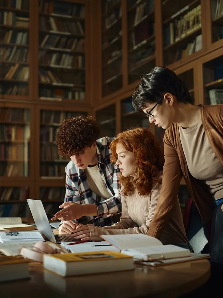 Students researching in a library