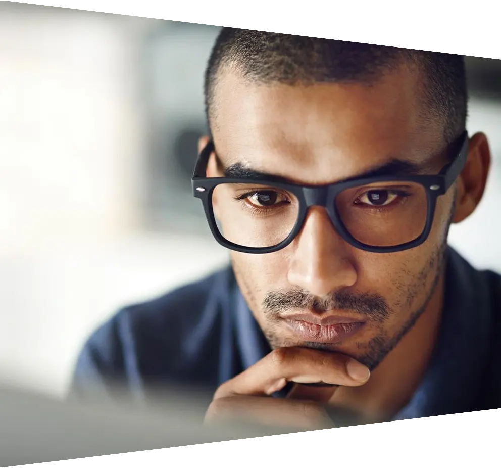 Close up shot of businessman using computer in home office
