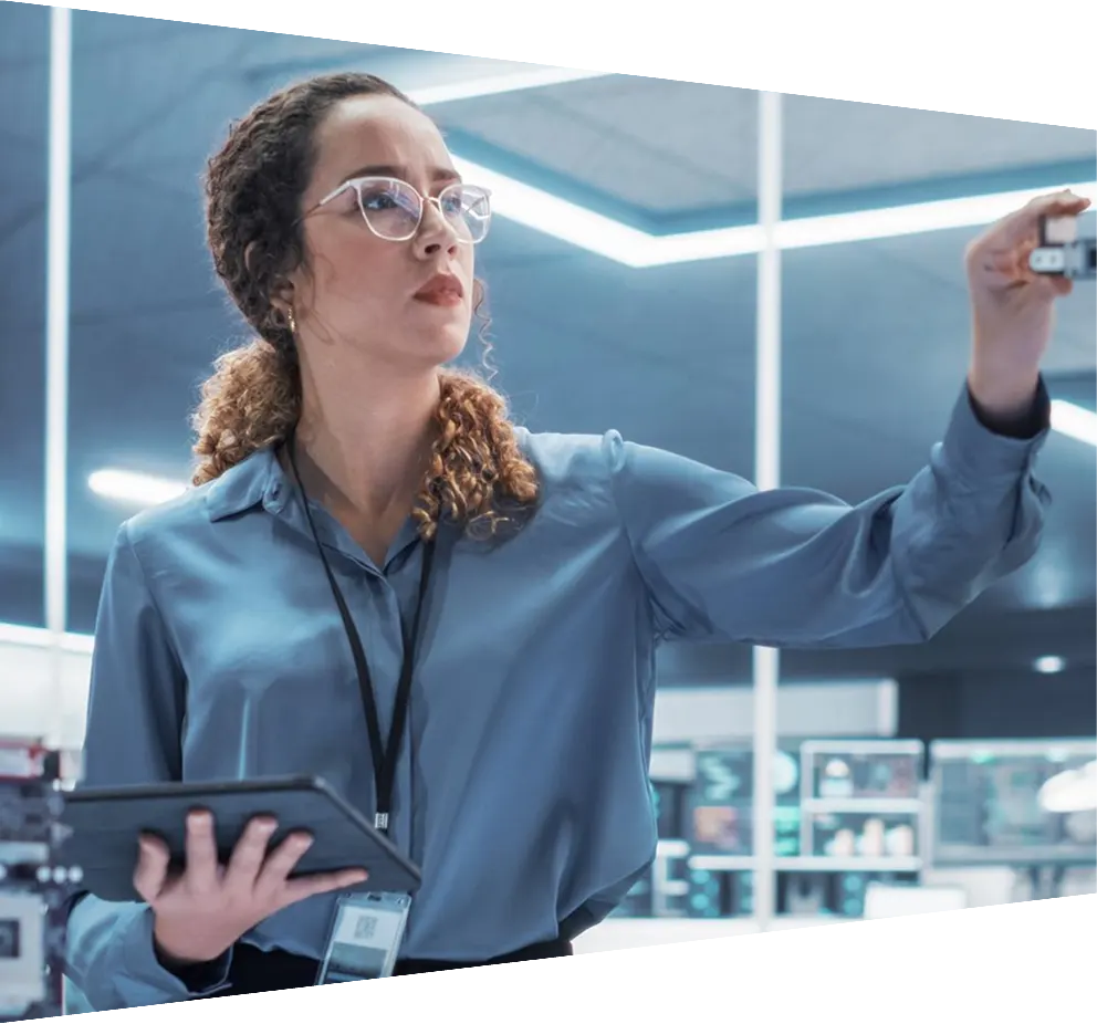Colleagues using a digital tablet while working in a data centre