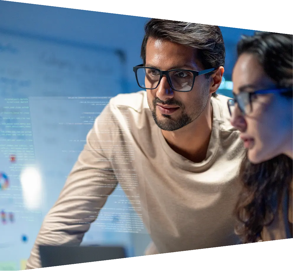 Advisor looking at financial analytics graphs on computer screen