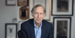 Photo of Robert Langer on a decorative background