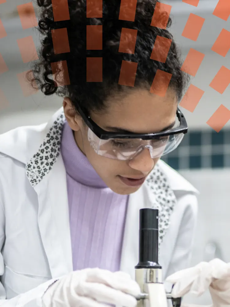 Close-up of female researcher working in a lab