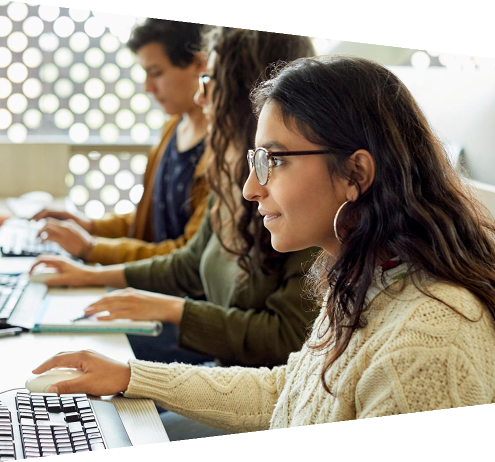 Woman with glasses working on computer