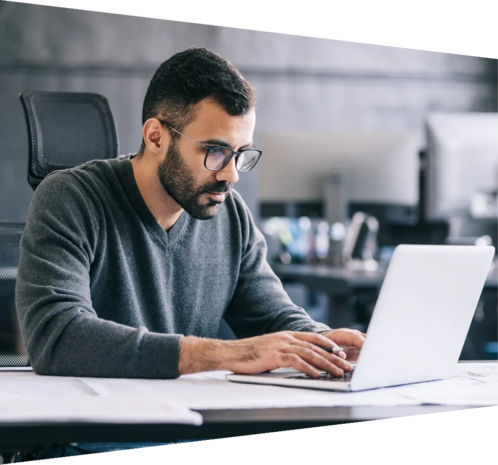 Man and woman looking at computer